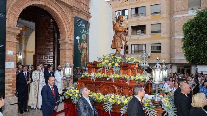 Salida de San Isidro de la iglesia de El Ejido / (El Ejido)